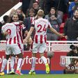 Stoke City's Jese (C) celebrates with teammates after scoring a goal during their English Premier League match against Arsenal, at the Bet365 Stadium in Stoke-on-Trent, on August 19, 2017