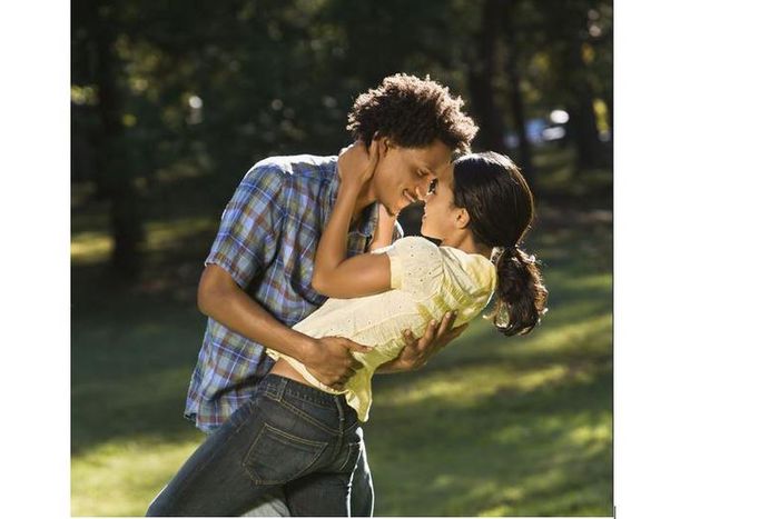 Wrap your arms around his neck and don't stop staring at his lips.