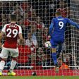 Leicester City's English striker Jamie Vardy (R) scores his side's second goal past Arsenal's Czech goalkeeper Petr Cech during the English Premier League match at the Emirates Stadium in London on August 11, 2017