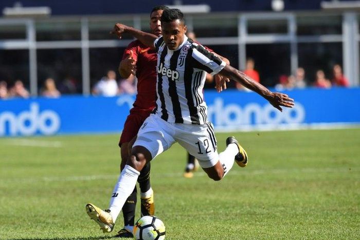 Juventus F.C Alex Sandro drives against Roma during their 2017 International Champions Cup match at Gillette Stadium in Foxborough, Massachusetts