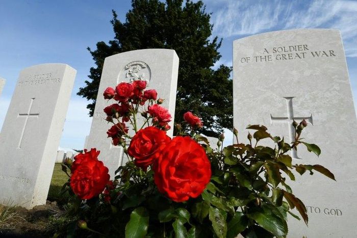Headstones of soldiers who fell in World War One at The Tyne Cot Commonwealth War Graves Cemetery in Zonnebeke on July 31, 2017, as part of a series of commemorations for the 100th anniversary of the Battle of Passchendaele