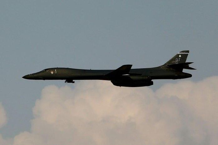 A US B1-B bomber and two F-15 fighters with the Japan Air Self-Defense Force flew over the neighbouring East China Sea, the US Pacific Air Forces Public Affairs office said