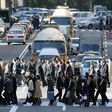 Japan's government says it will push further for measures against work-related suicides, saying that cutting extreme work hours and preventing harassment by bosses are necessary