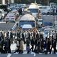 Japan's government says it will push further for measures against work-related suicides, saying that cutting extreme work hours and preventing harassment by bosses are necessary