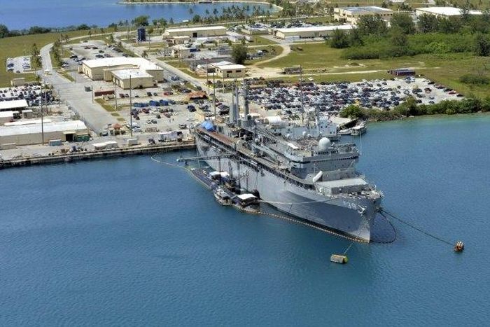 This image obtained from the US Department of Defense shows the submarine tender USS Emory S. Land and the Los Angeles-class attack submarine USS Topeka pierside in their home port at Polaris Point, Guam