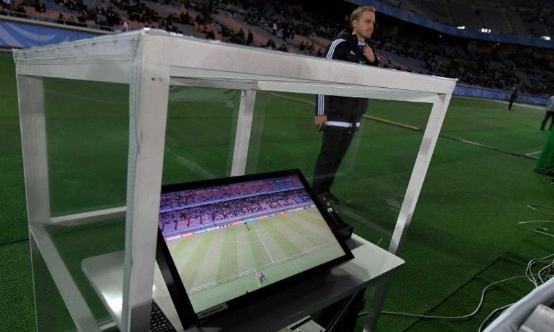 The video assistant referee system is placed beside the pitch prior to the Club World Cup semi-final football match between Mexico's Club America and Spain's Real Madrid at Yokohama International stadium in Yokohama on December 15, 2016