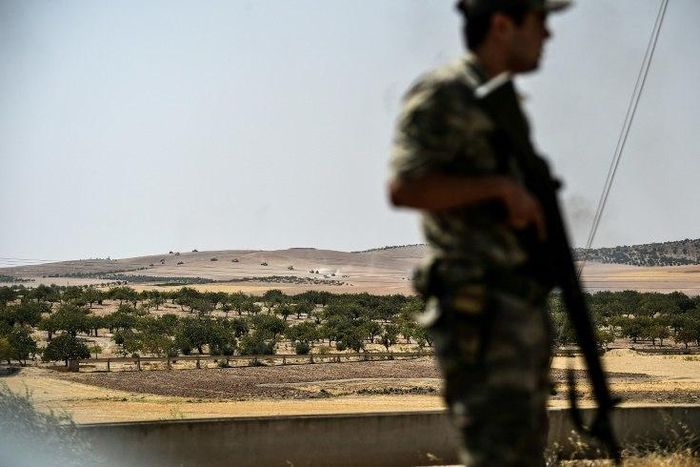 Turkish authorities have detained a group of soldiers who were filmed allegedly beating up and verbally abusing four young Syrians