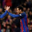 Barcelona's forward Lionel Messi (L) celebrates with Barcelona's forward Neymar (R) after scoring a goal during the Spanish league football match against Celta de Vigo March 4, 2017