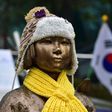 A statue of a teenage girl symbolising former "comfort women" who served as sex slaves for Japanese soldiers during World War II, in front of the Japanese embassy in Seoul