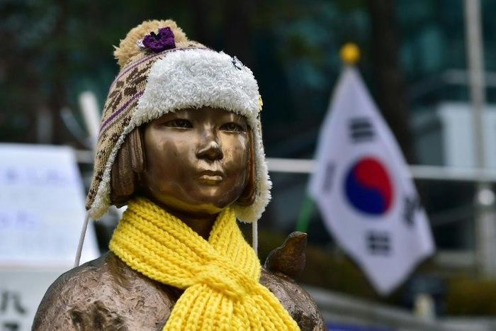 A statue of a teenage girl symbolising former "comfort women" who served as sex slaves for Japanese soldiers during World War II, in front of the Japanese embassy in Seoul