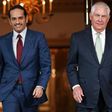 Qatari Foreign Minister Sheikh Mohammed bin Abdulrahman Al-Thani(L) heads into talks with US Secretary of State Rex Tillerson in Washington on June 27, 2017