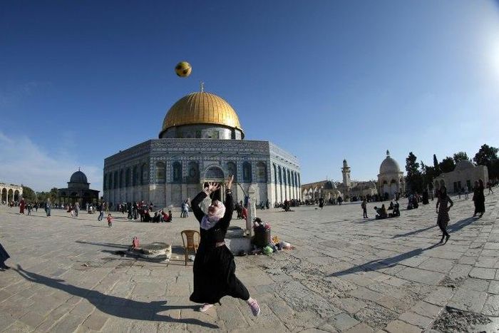 French President Emmanuel Macron said Israelis and Palestinians should be able "to live side by side within secure and recognised borders with Jerusalem as the capital"