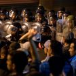 Police face protesters during a night demonstration in Morocco's Al-Hoceima on June 9, 2017