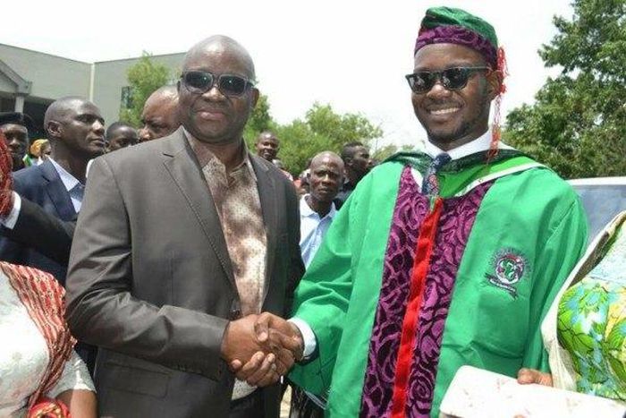 Governor Ayodele Fayose and his son.