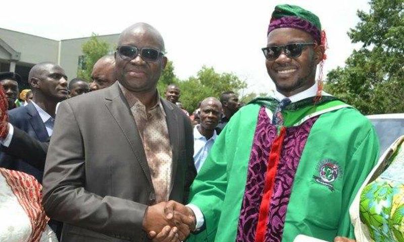 Governor Ayodele Fayose and his son.
