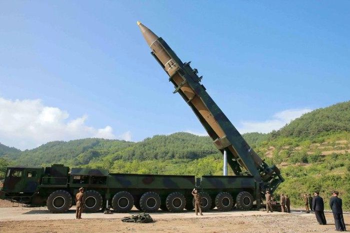 This picture taken and released on July 4, 2017 by North Korea's official Korean Central News Agency (KCNA) shows North Korean leader Kim Jong-Un (2nd R) inspecting the test-fire of the intercontinental ballistic missile Hwasong-14 at an undisclosed lo...