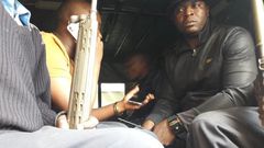 Embakasi Central MP Benjamin Gathiru (in yellow shirt) at the back of a police Land Rover (Twitter)