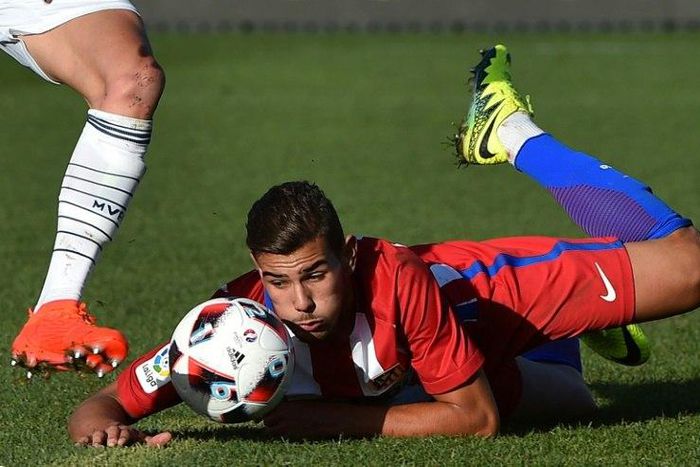 This photo taken on July 31, 2016 shows Atletico's Theo Hernandez during the friendly football match between Spanish side Atletico Madrid and Australian side Melbourne Victory in Geelong near Melbourne