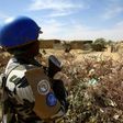 A member of the peacekeeper troops stands guard at a UN refugee camp in the city of Nyala, in South Darfur, on January 9, 2017