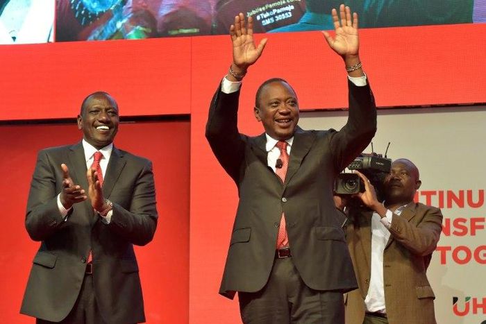 Deputy President William Ruto, left, with his running mate President Uhuru Kenyatta in June
