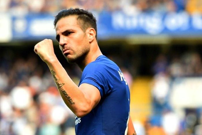 Chelsea's Spanish midfielder Cesc Fabregas celebrates scoring his team's first goal during the English Premier League match against Everton at Stamford Bridge in London on August 27, 2017