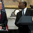 Merck CEO Kenneth Frazier is seen here with President Donald Trump at a White House event in July.