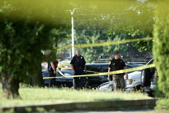 Police tape cordons off the scene of an early morning shooting in Alexandria, Virginia, on June 14, 2017