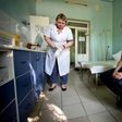 A patient waits in a hospital treating drug users in the rebel capital of Donetsk, Ukraine
