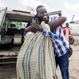 Emmanuel, 17, hugs his mother as they reunite in Aburoc, South Sudan after more than three years, forced apart by the civil war which began in 2013