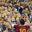 Roma's captain Francesco Totti greets fans holding placards with his number 10 during a ceremony following his last match with AS Roma after the Italian Serie A football match against Genoa in Rome May 28, 2017