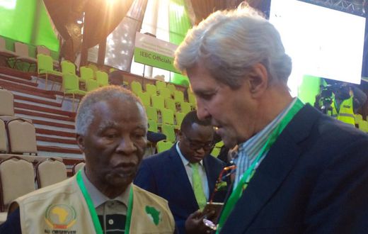 John Kerry consulting Former SA President Thabo Mbeki
