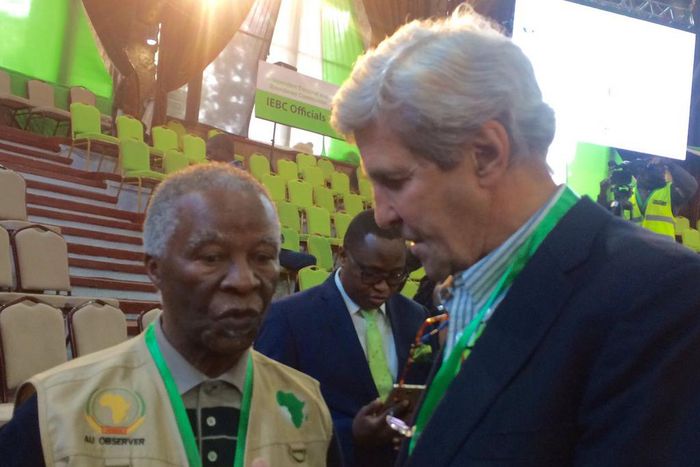 John Kerry consulting Former SA President Thabo Mbeki