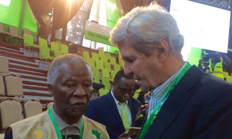 John Kerry consulting Former SA President Thabo Mbeki