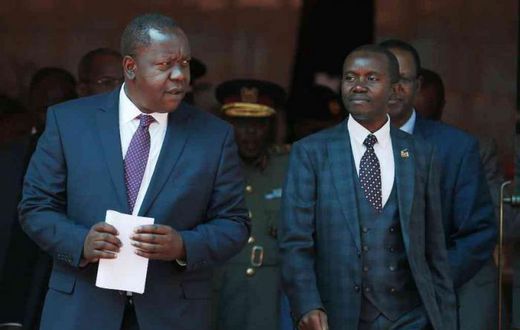 Interior CS Fred Matiang'i and ICT CS Joe Mucheru. Government takes action after M-Pesa outage