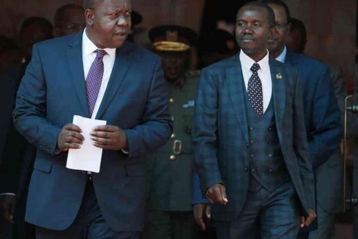 Interior CS Fred Matiang'i and ICT CS Joe Mucheru. Government takes action after M-Pesa outage