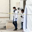 Forensic personnel work on a crime scene where attackers burst into a party and killed 11 people in Tizayuca, Mexico