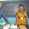 Professor George Magoha oversees the opening of exam papers