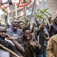 Supporters of Kenyan opposition presidential candidate Raila Odinga protest the election results in Nairobi's Mathare slum