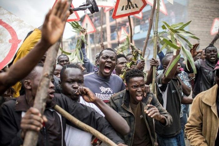 Supporters of Kenyan opposition presidential candidate Raila Odinga protest the election results in Nairobi's Mathare slum