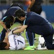 South Korea's Son Heung-Min receives medical treatment during the World Cup qualifier against Qatar in Doha on June 13, 2017