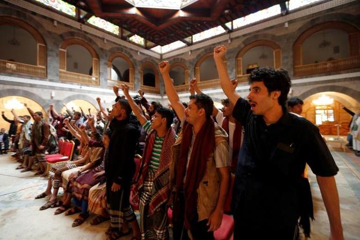 Freed Yemeni prisoners attend a meeting with the leader of the rebels' supreme political council in Sanaa on January 31, 2017, after their release as part of a prisoner exchange