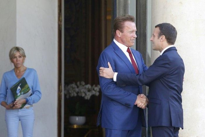 French President Emmanuel Macron, seen welcoming ex-California governor-turned climate campaigner Arnold Schwarzenegger to Paris, is hosting the launch of a draft "Global Environment Pact"