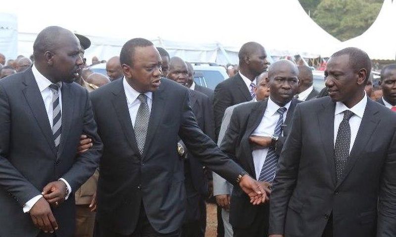 Uhuru with his deputy William Ruto and Senator Murkomen at a past function