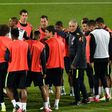 Brazil's head coach Tite (4th R) instructs his players during a training session in Melbourne, on June 7, 2017