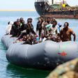 Illegal migrants, who were rescued by the Libyan coastguard in the Mediterranean Sea off the Libyan coast, arrive at a naval base in Tripoli, on May 6, 2017