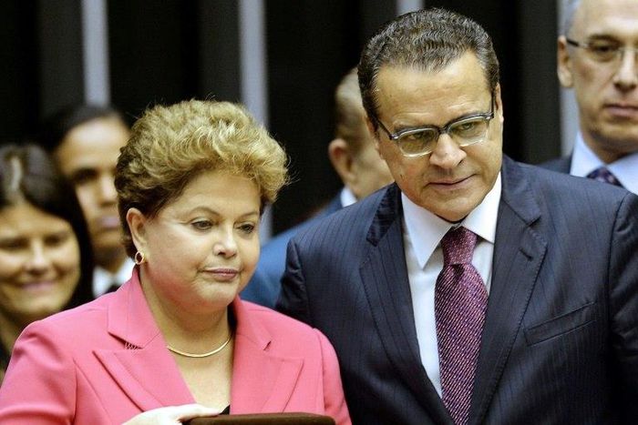 Brazilian former tourism minister Henrique Eduardo Alves (R) is seen with former President Dilma Rousseff in 2013