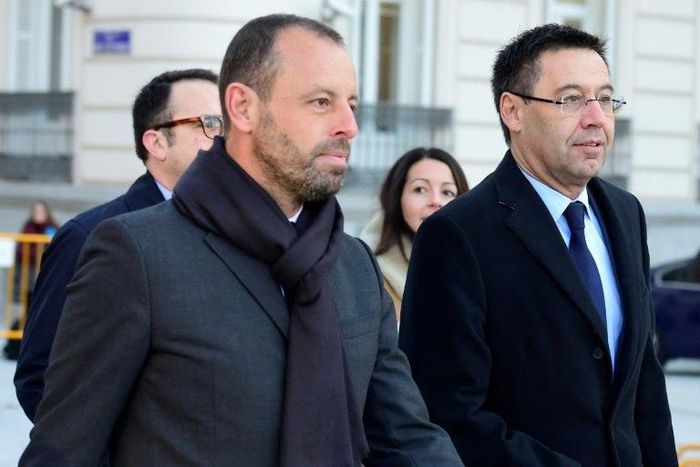 FC Barcelona's former president Sandro Rosell (L), pictured in February 2016, acted as a consultant for Qatar's bid to host the 2022 World Cup, and allegedly sent $2 million to the bank account of a FIFA official's 10-year-old daughter
