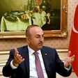 Turkish Foreign Minister Mevlut Cavusoglu attends a news conference in Kuwait City on June 15, 2017 as part of a regional tour aimed at resolving the Gulf crisis