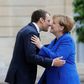German Chancellor Angela Merkel is welcomed by French President Emmanuel Macron upon her arrival