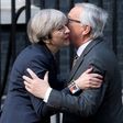Kiss, off: European Commission President, Jean-Claude Juncker embraces British Prime Minister Theresa May outside 10 Downing Street in April. There are fears that the Brexit negotiations could be much less friendly.